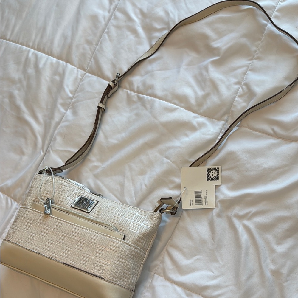 Anne Klein Cream Embossed Crossbody Bag with Flap Closure